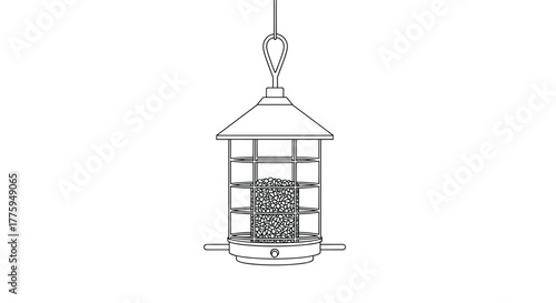A hanging metal bird feeder filled with seeds, designed to attract and feed various wild birds in a garden or backyard setting.