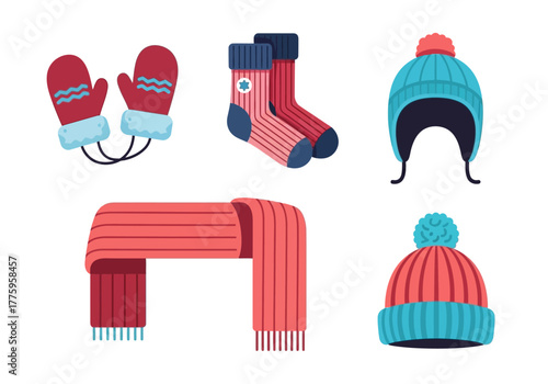 Winter gear gloves socks scarf  two pompom hats arranged on a white background