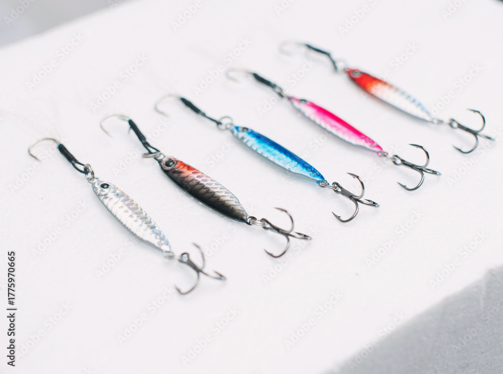 Fototapeta premium Metal fishing lure on white background