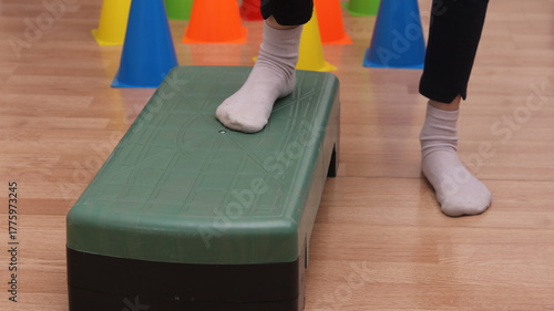 kids leg on step platform, fitness at home