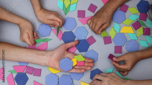 children playing together with ooden toys, flat lay