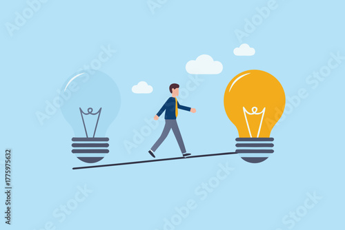 Man walking on a tightrope between two light bulbs representing ideas and innovation