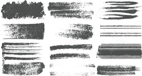 Collection of dark gray textured brush strokes and lines on white background paint grunge