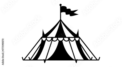 Classic circus tent with a flag waving in the wind, evoking a sense of fun and entertainment.