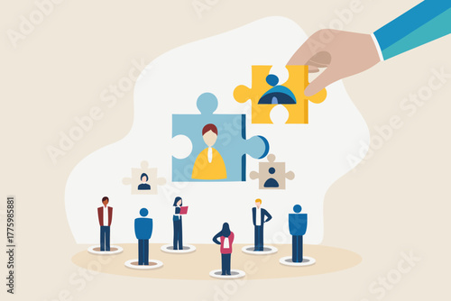 Hand placing a puzzle piece with a person icon into a larger puzzle representing team building and recruitment