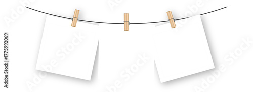 Polaroid photo frame hanging on rope with clothespins, blank square template for photo display, scrapbook design, memory board, isolated on transparent background.