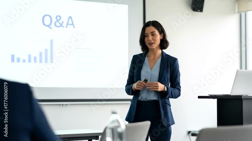Professional woman delivering a presentation on Q&A session at a business conference or seminar or