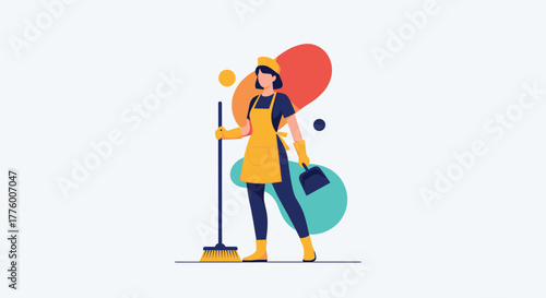 Woman cleaner in yellow apron and cap holding broom and dustpan, ready to clean.