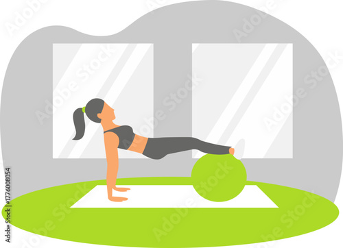 Woman doing plank exercise on stability ball.