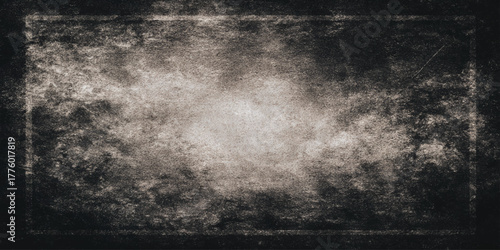 Textured black grunge wall design with cracked distressed surface old industrial tone abstract rough background.