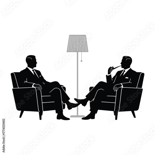 Two men in chairs talking