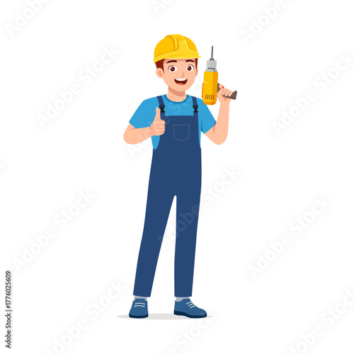 Happy Young Caucasian Man Wearing Overalls Holding Drill with Thumbs Up