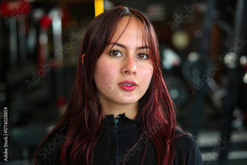 Wallpaper Mural Young woman with determination engaging in fitness workout Torontodigital.ca