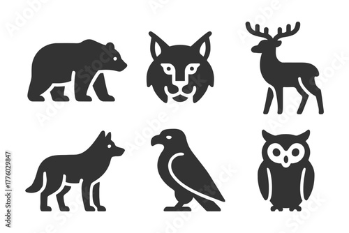 Silhouette icons of wild animals - bear, lynx, deer, wolf, eagle, owl.