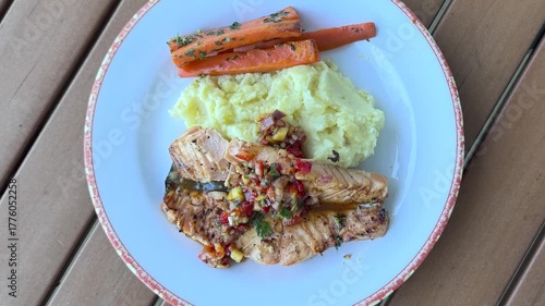 Rotating Plate of Grilled Salmon with Mango Salsa