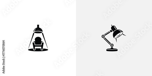 Black and White Design Featuring an Armchair Under a Spotlight and a Desk Lamp