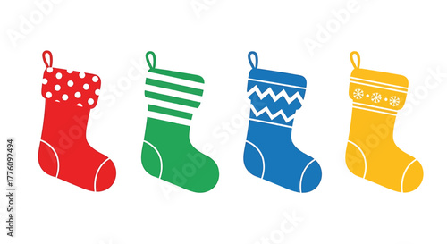 Four festive christmas stockings in red green blue and yellow with playful patterns ready for gifts vector