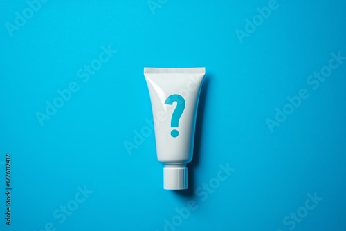 Colorful toothpaste tube on a blue background