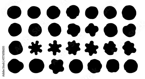 Collection of abstract black shapes arranged in rows, showing variations in form and silhouette.
