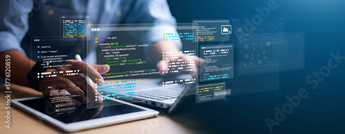 AI developer coding on laptop and tablet with virtual interface, data visualization, and programming code. Concept of artificial intelligence, software development, and innovation.