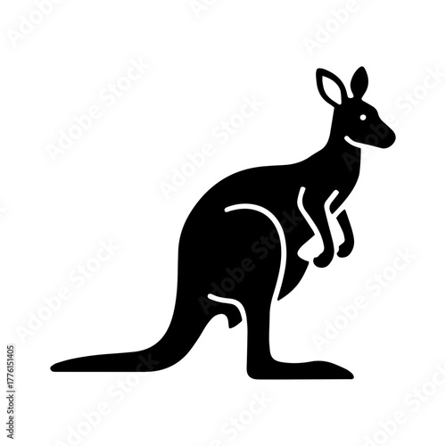 Black silhouette of a kangaroo standing and looking forward  