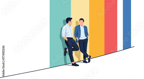 Two young businessmen casually leaning against a colorful wall during a break, engaged in a friendly and relaxed conversation.