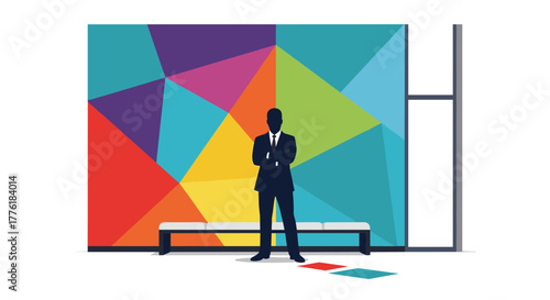 Silhouette of a confident businessman standing with arms crossed in front of a colorful abstract art wall in a modern office.