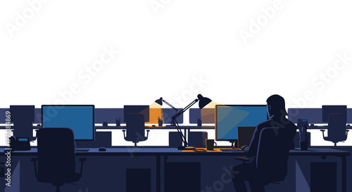 Silhouette of a dedicated employee working late at night in a dark office, illuminated only by a desk lamp and computer screen.