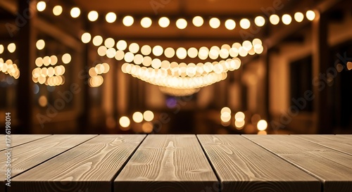 Elegant wooden table against blurred background of warm lights display