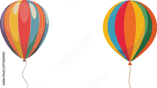 Two colorful striped balloons floating against a plain white background