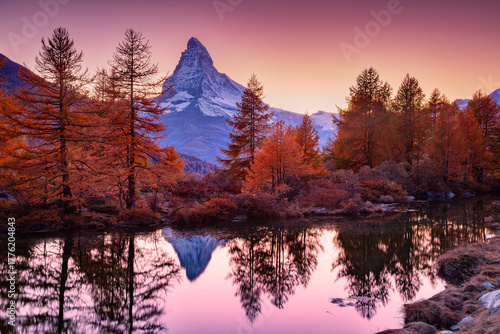 Matterhorn, Swiss Alps, Switzerland. Landscape image of Swiss Alps with Grindjisee and iconic peak Matterhorn in the background at beautiful autumn sunset.