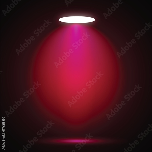 Spotlight beaming bright magenta light on a dark stage background