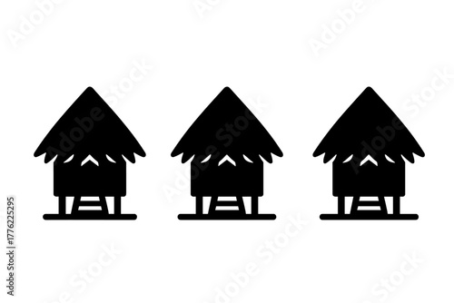 Unique silhouette of three traditional houses with pointed roofs on a white background showcasing cultural architecture