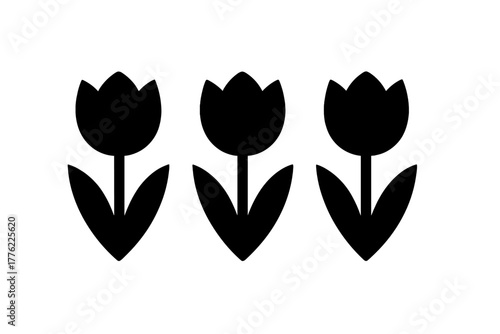 Black silhouette of three tulips standing in a row against a white background