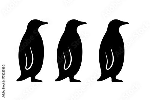 Three playful penguins standing side by side with a simple black silhouette design