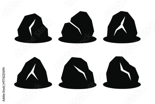 Various shapes of rocks with cracks displayed in a simple black and white style