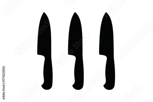 Three kitchen knives arranged in a lineup showing different sizes and styles for food preparation needs