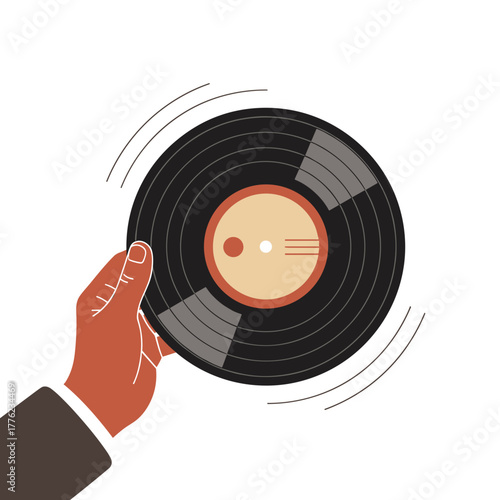 Hand holding a vinyl record while spinning on a white background  