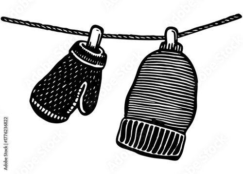 Cozy winter mittens vector silhouette hanging on a clothesline for seasonal apparel and cold weather