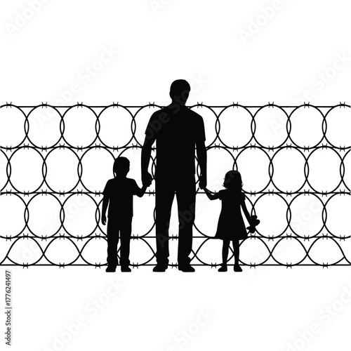 Family silhouette holding hands in front of barbed wire fence