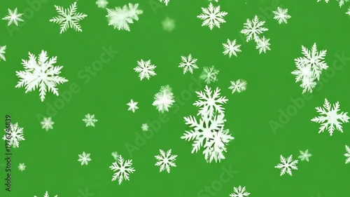 Wallpaper Mural Falling snowflakes on a green background, winter holiday decoration Torontodigital.ca