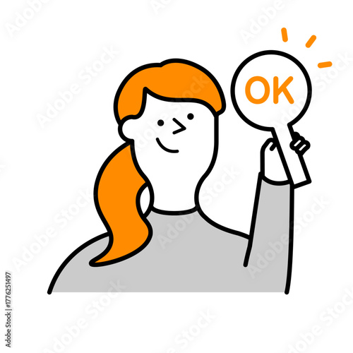 OKマークの札を出す女性