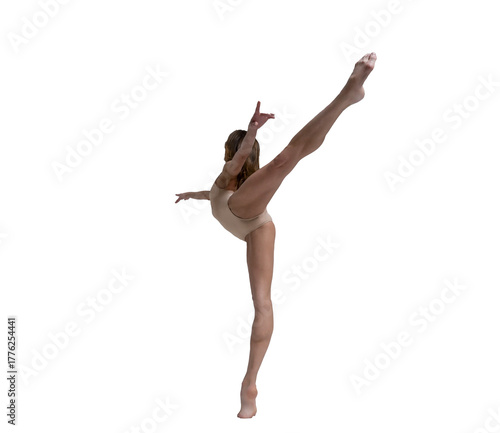 ballerina with beautiful feet poses in a photo studio, a ballerina in leotard shows an arabesque attitude