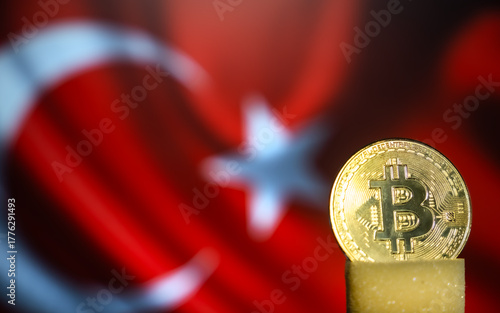 Fototapeta Naklejka Na Ścianę i Meble -  Metal Bitcoin Figure coin with a flag of Turkiye /Turkey behind
