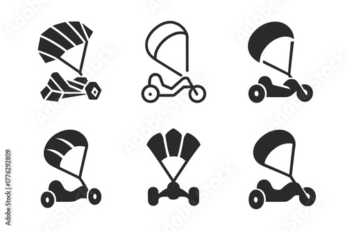 Kite Buggy Logos. Kite buggy. Set Logo of Kite buggy: traction kite towing sand buggy. harmonious logo variations of the same emblematic concept, each with