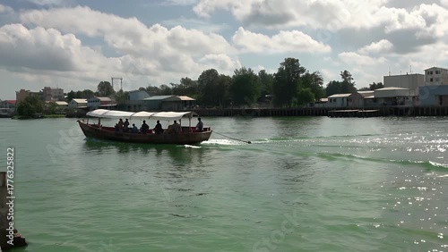 Wallpaper Mural The flowing currents of a major waterway moving towards its vast fertile estuary region  serving as a vital artery for local populations and commercial Torontodigital.ca