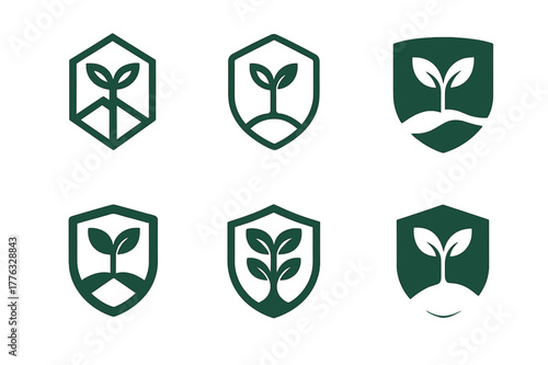 Rainforest Shield Logos. Rainforest conservation. Set Logo of Rainforest conservation: shield with sprouting tree. harmonious logo variations of the same