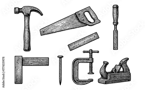 Vintage engraved woodworking tools collection including hammer and saw