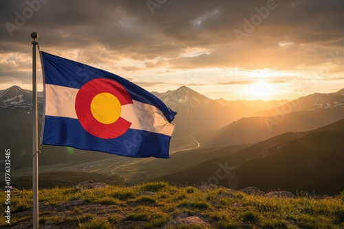 Flag of the state of colorado in united states of america, waving on the wind with a landscape of the country in the background