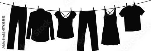 Black clothes hanging on clothesline laundry day fashion style